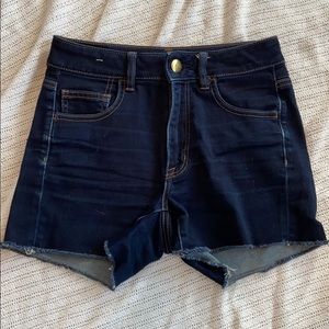 American Eagle dark washed raw hem shorts